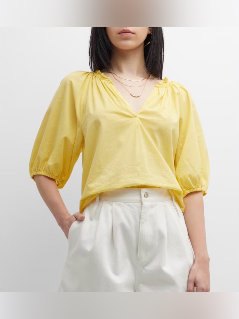 Xirena Jules Ruched Puff-Sleeve Cotton V Neck Puff
Balloon 1/2 top size L yellow